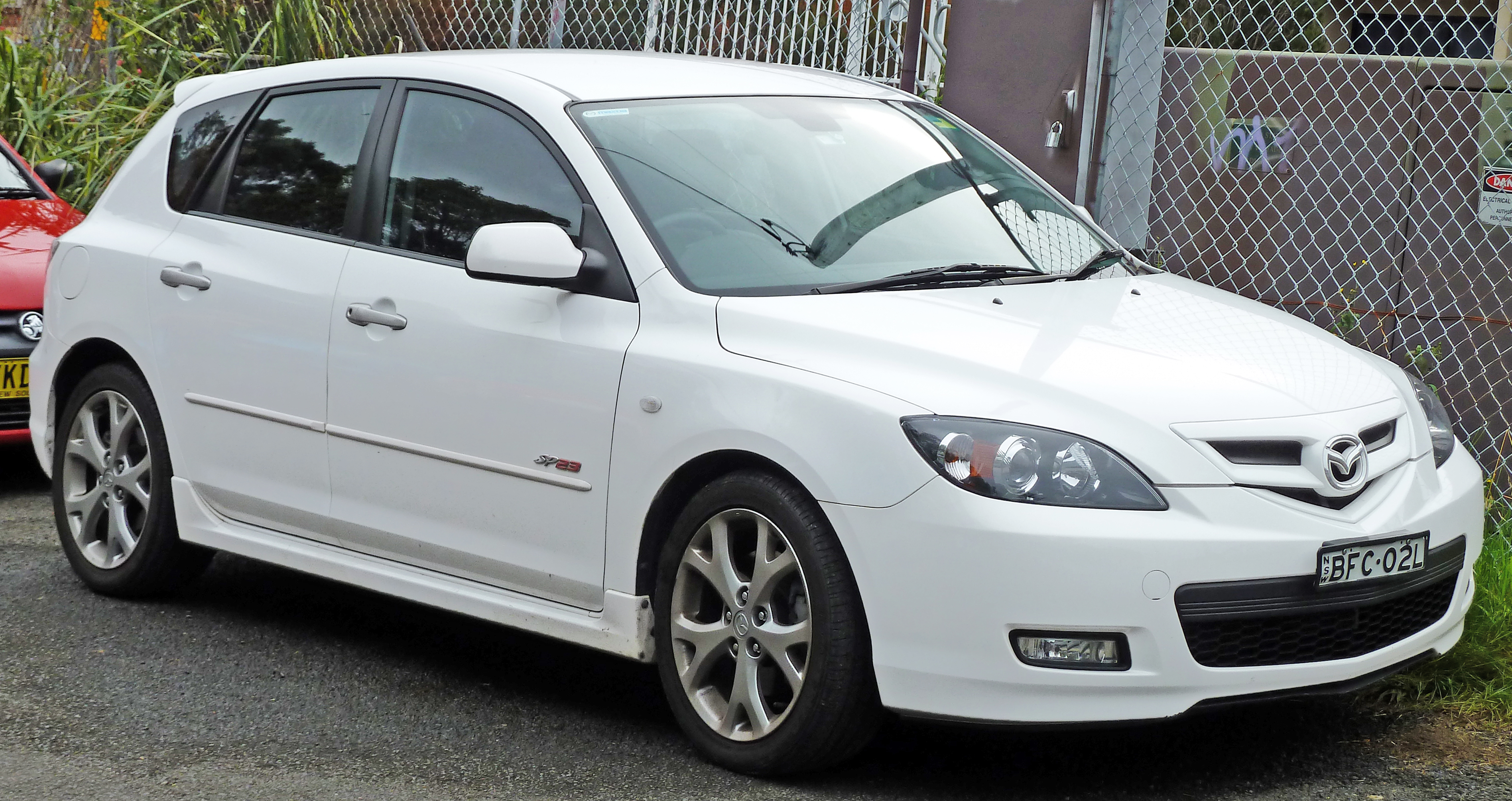 2008-2009_Mazda_3_(BK_Series_2)_SP23_hatchback_01.jpg